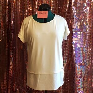 White shirt sleeved tunic type top in size small by. CALVIN KLEIN